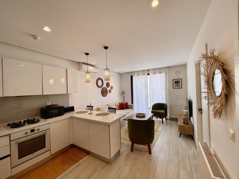 Stylish 1BR with Balcony | Central & Equipped - The Landlord